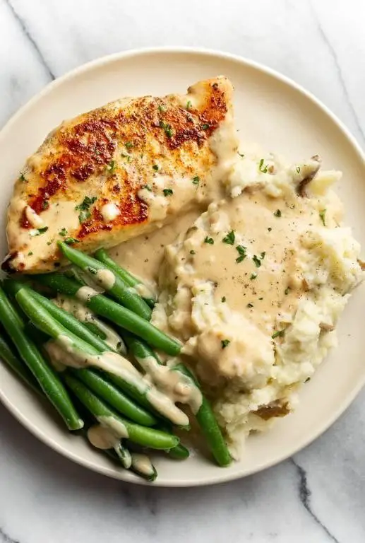 Garlic Parmesan Baked Chicken Breast with Creamy Alfredo Sauce