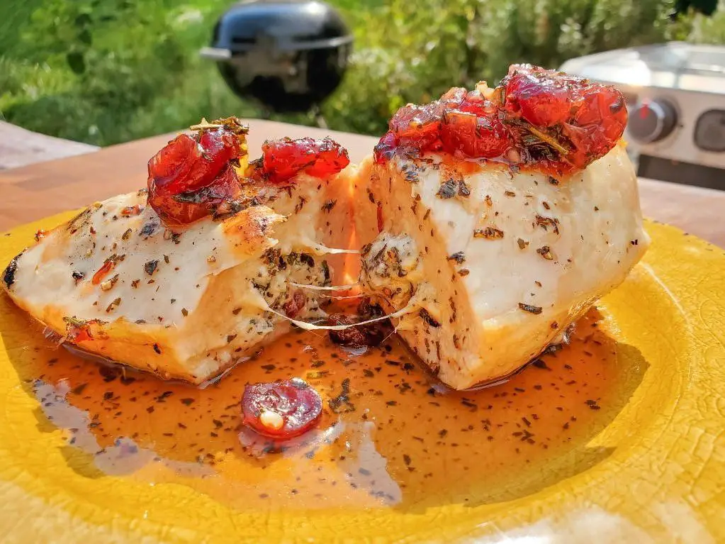 Herbed Goat Cheese Stuffed Baked Chicken Breast with Cranberry Sauce