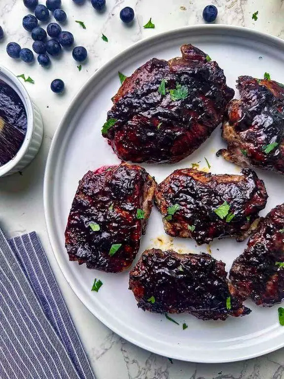 Smoked Chicken Thighs with Blueberry BBQ Sauce