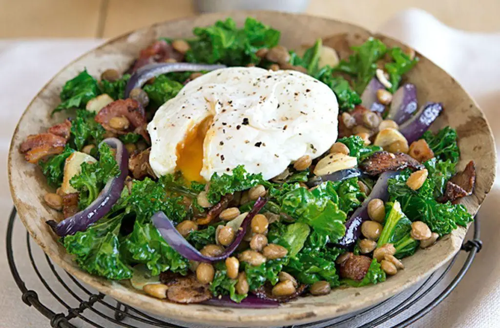 Warm Kale Salad with Bacon and Poached Egg